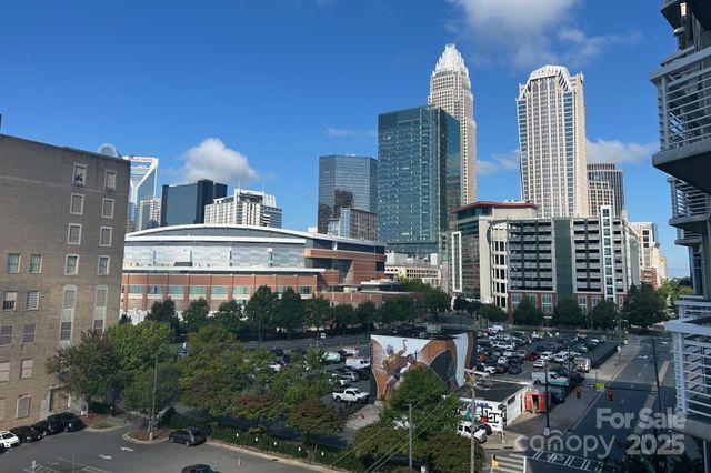 a view of a building and yard