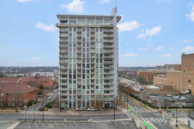 a view of a city with tall buildings