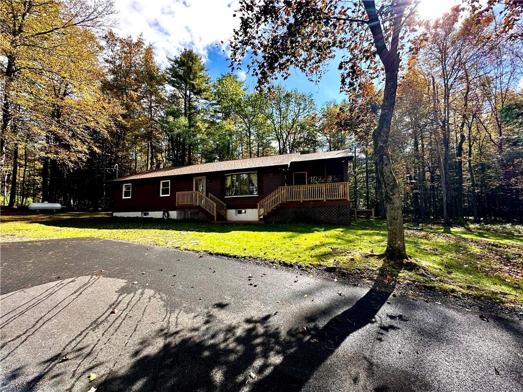 132 Proctor Road Eldred, NY 12732 - Photo 1 of 1 a view of a house with swimming pool and yard