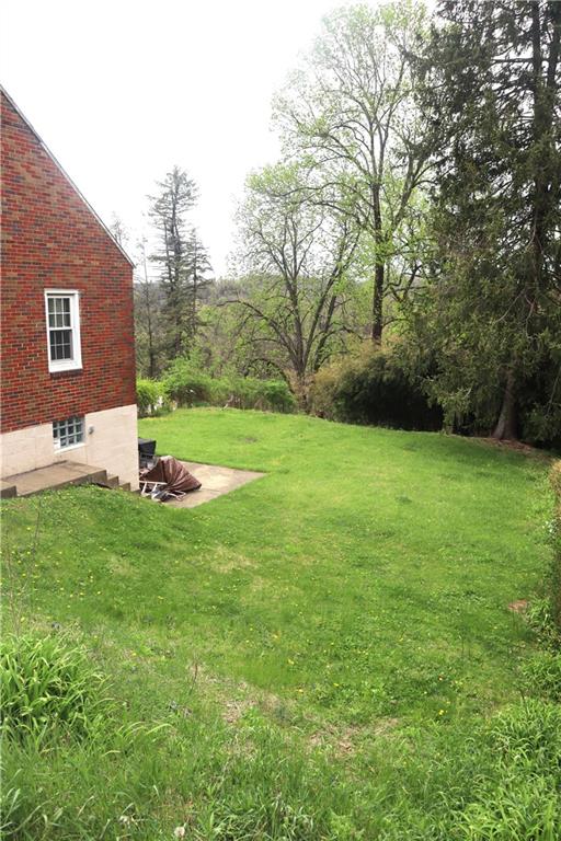 3059 Mt Troy Road Pittsburgh, PA 15212 - Photo 26 of 28 Large backyard offers plenty of space for outdoor enjoyment and relaxation.