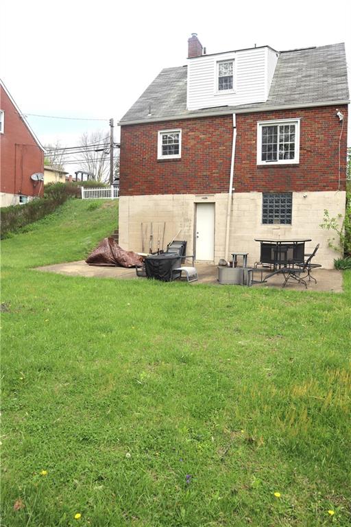 3059 Mt Troy Road Pittsburgh, PA 15212 - Photo 27 of 28 Cement patio pad creates the perfect setup for grilling and outdoor dining.
