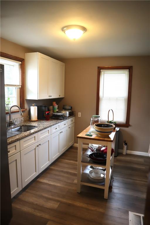 3059 Mt Troy Road Pittsburgh, PA 15212 - Photo 10 of 28 Functional kitchen layout with ample cabinetry for storage and organization. Kitchen is 13'x8'
