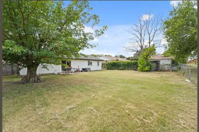 a view of house with outdoor space
