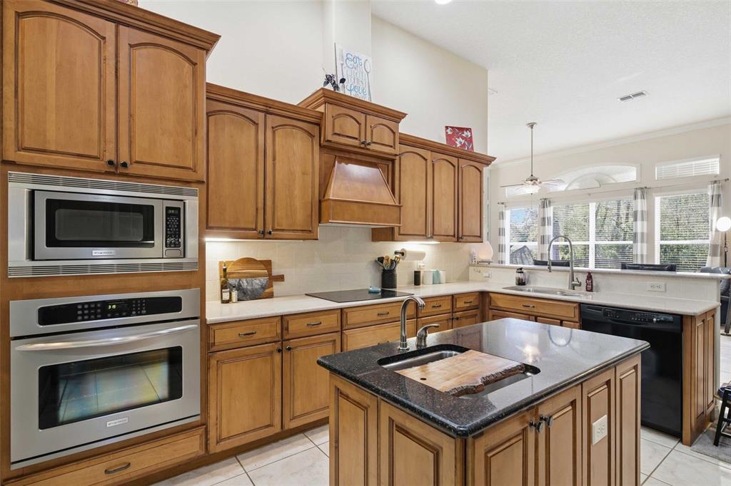 5580 South Kline Terrace Inverness, FL 34452 - Photo 2 of 55 a kitchen that has a sink and a stove top oven in it