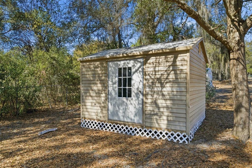 5580 South Kline Terrace Inverness, FL 34452 - Photo 26 of 55 a front view of a house with a tree