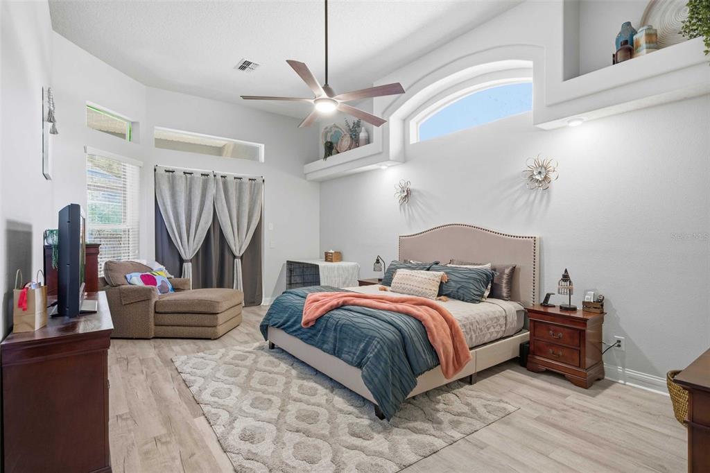 5580 South Kline Terrace Inverness, FL 34452 - Photo 3 of 55 a bedroom with a bed and a couch