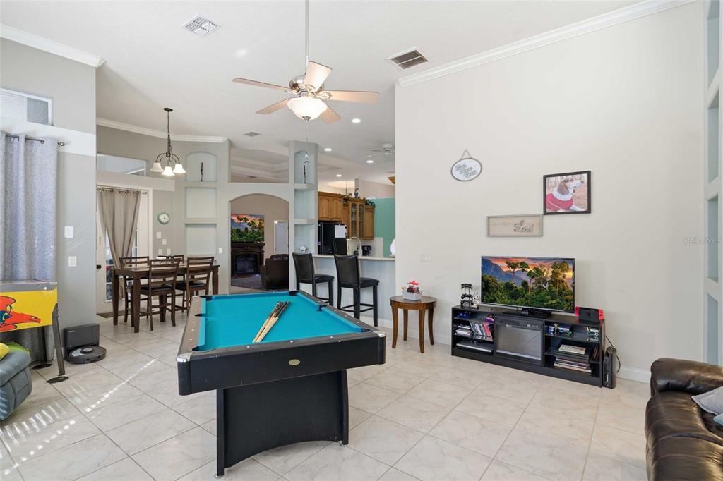 5580 South Kline Terrace Inverness, FL 34452 - Photo 31 of 55 a living room with furniture and a flat screen tv