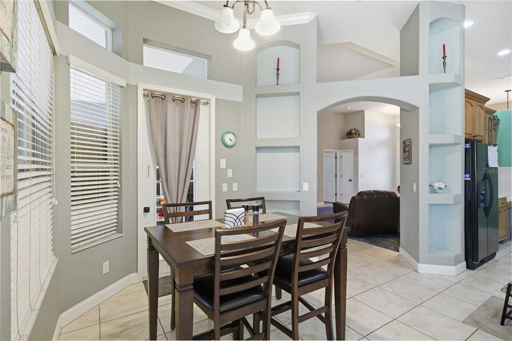 5580 South Kline Terrace Inverness, FL 34452 - Photo 32 of 55 a view of a dining room with furniture and a window