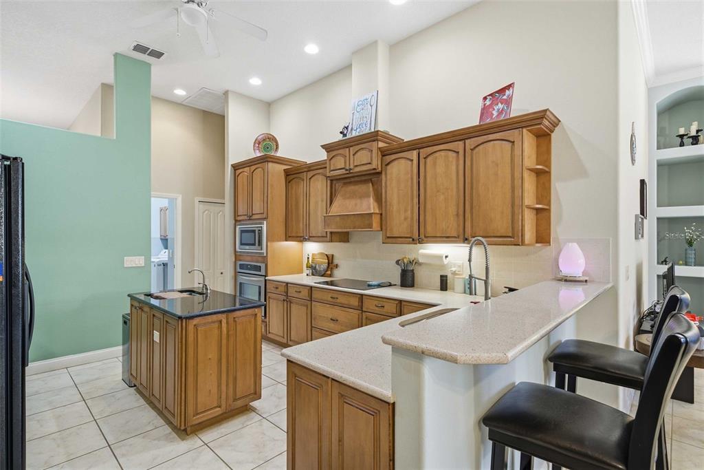 5580 South Kline Terrace Inverness, FL 34452 - Photo 34 of 55 a kitchen with a sink and cabinets