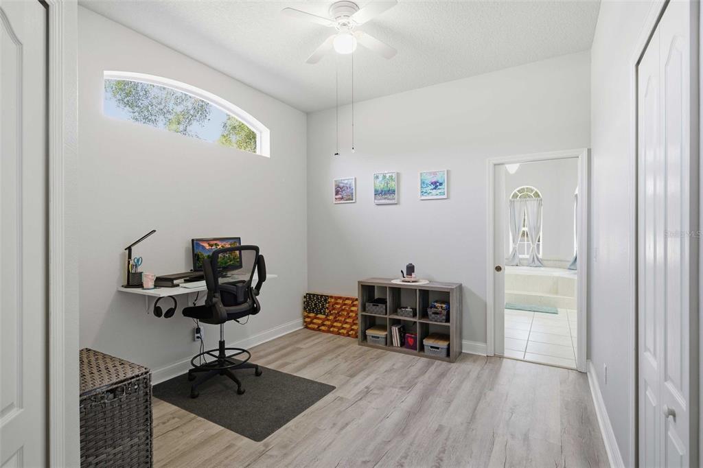 5580 South Kline Terrace Inverness, FL 34452 - Photo 38 of 55 a view of a workspace with furniture and wooden floor
