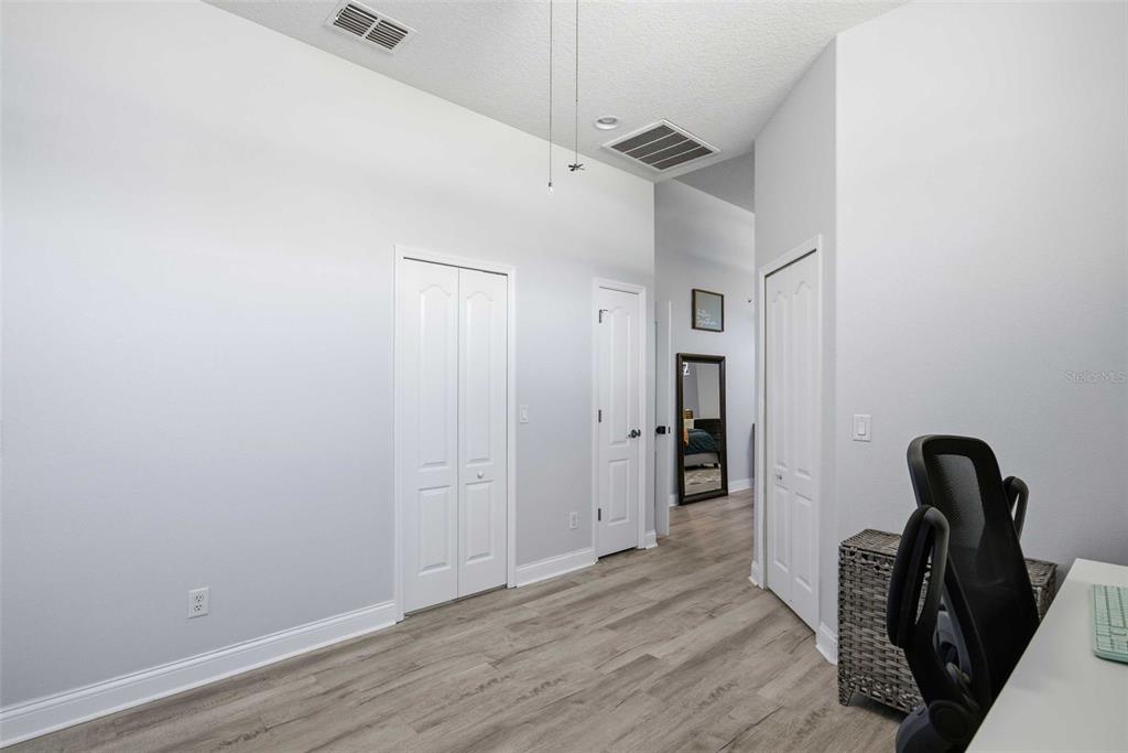 5580 South Kline Terrace Inverness, FL 34452 - Photo 39 of 55 a view of a hallway with wooden floor and staircase