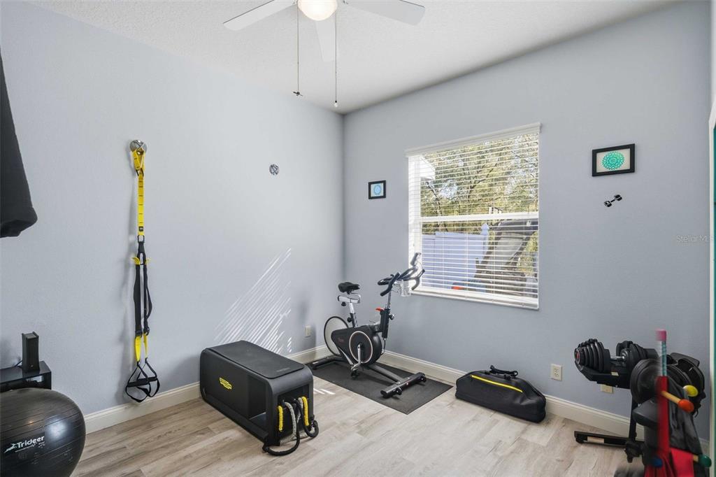 5580 South Kline Terrace Inverness, FL 34452 - Photo 44 of 55 a room with gym equipment and a window