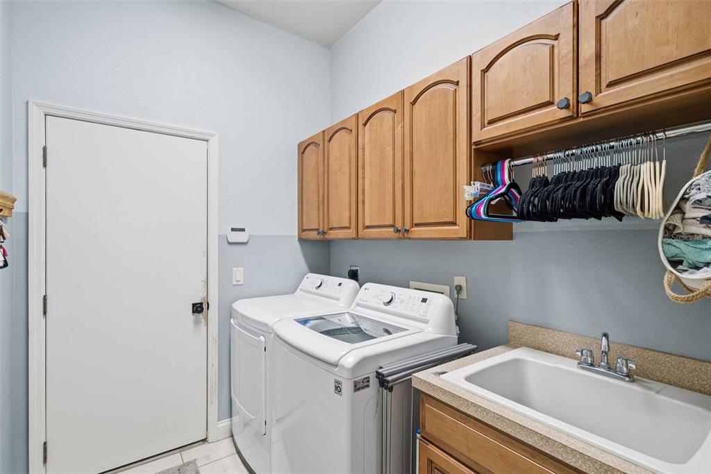 5580 South Kline Terrace Inverness, FL 34452 - Photo 49 of 55 a utility room with dryer and washer