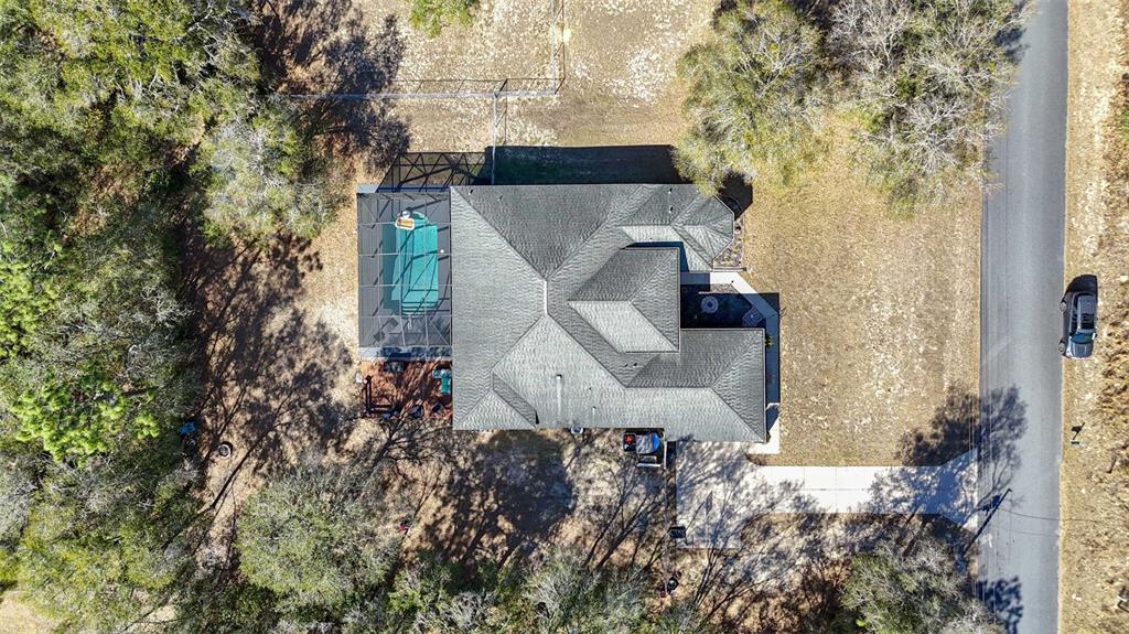5580 South Kline Terrace Inverness, FL 34452 - Photo 55 of 55 an aerial view of a house with a yard and large tree