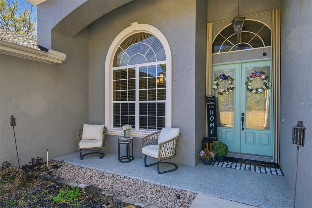 5580 South Kline Terrace Inverness, FL 34452 - Photo 9 of 55 a front view of a house with outdoor seating