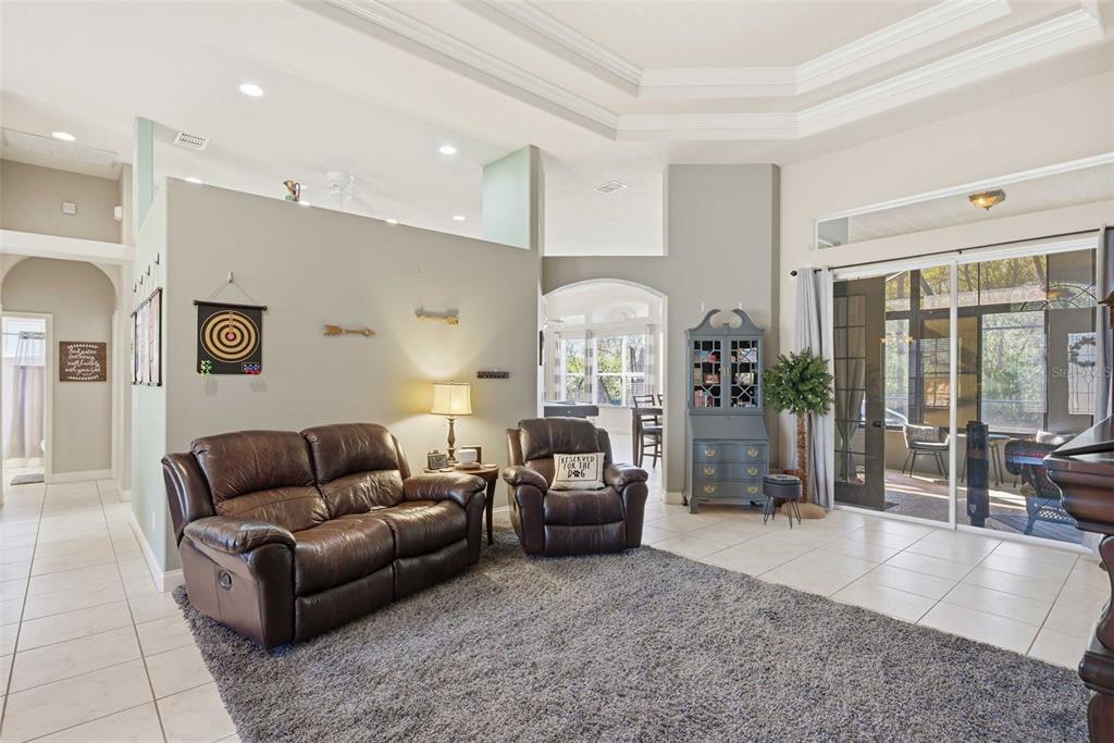 5580 South Kline Terrace Inverness, FL 34452 - Photo 10 of 55 a living room with furniture and a large window