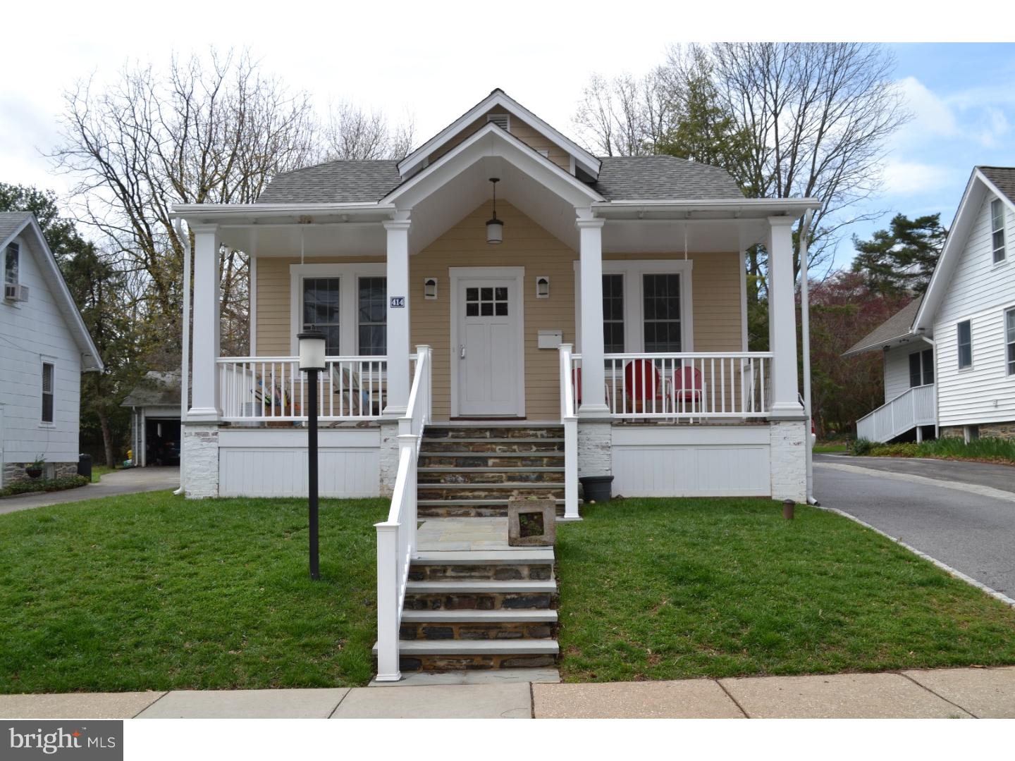 414 Righters Mill Road Gladwyne, PA 19035 - Photo 1 of 17 a front view of a house with a garden