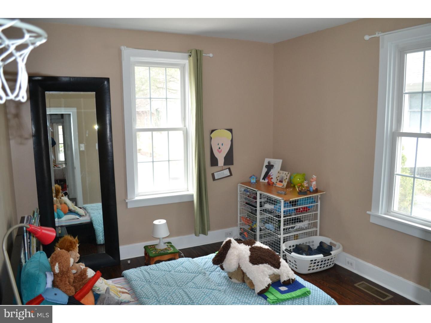 414 Righters Mill Road Gladwyne, PA 19035 - Photo 15 of 17 a living room with furniture a window and flowerpot