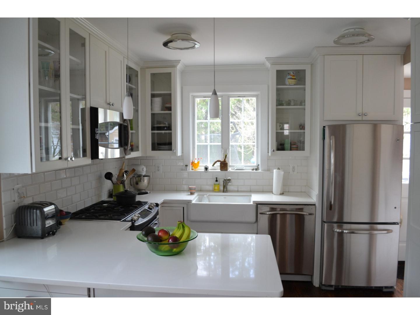 414 Righters Mill Road Gladwyne, PA 19035 - Photo 8 of 17 a kitchen with a refrigerator and a sink