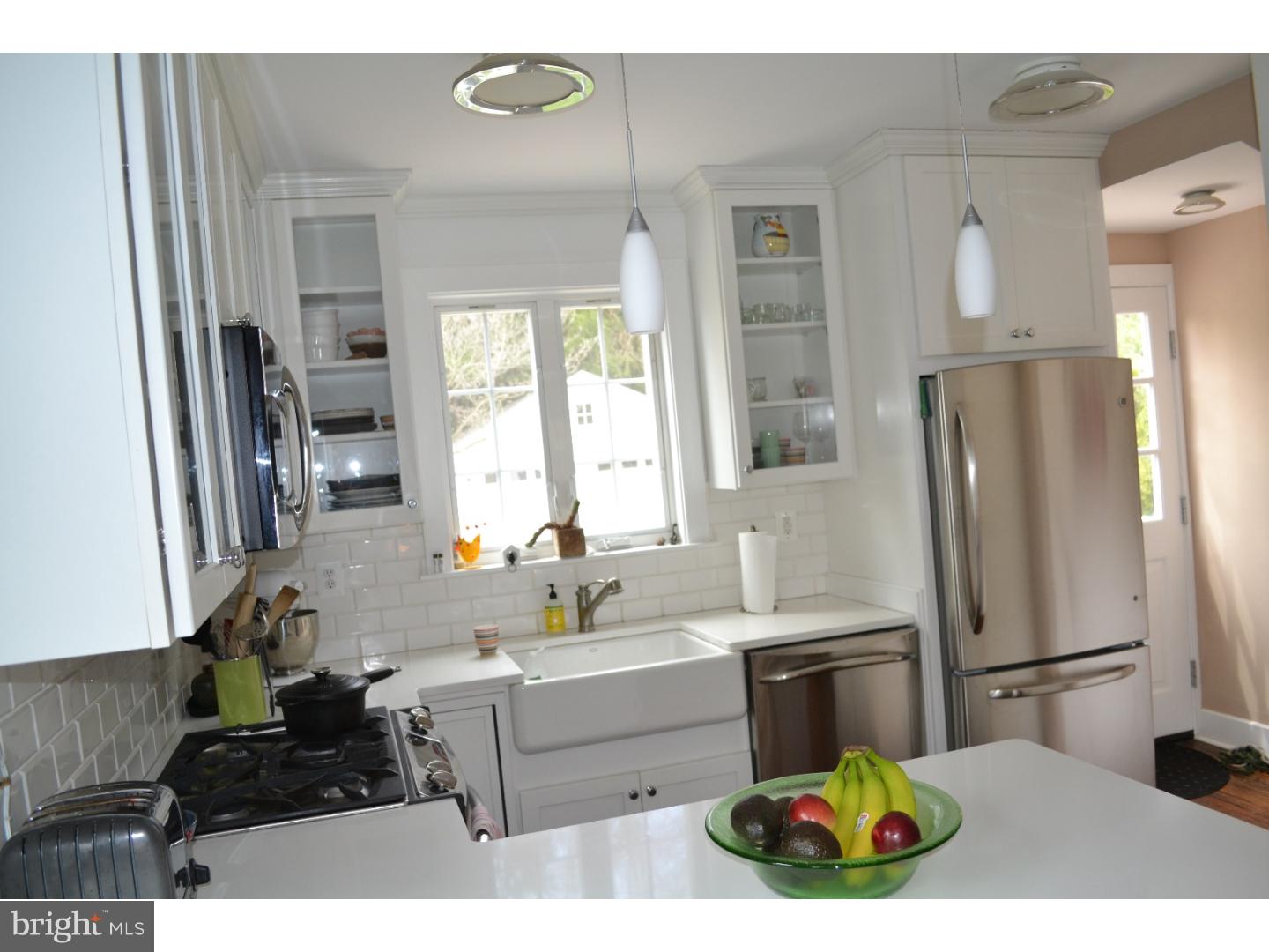 414 Righters Mill Road Gladwyne, PA 19035 - Photo 9 of 17 a kitchen with a refrigerator and a sink