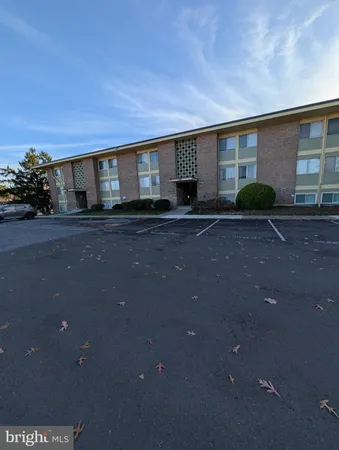a front view of a house with yard