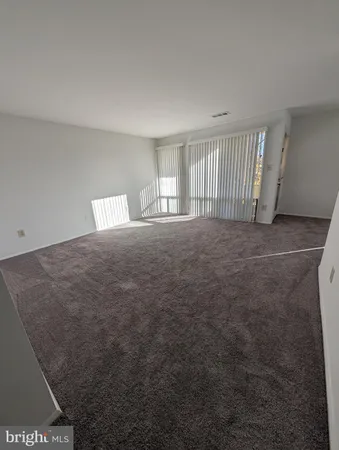 a view of an empty room with window