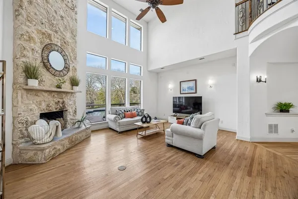a living room with furniture and a fireplace