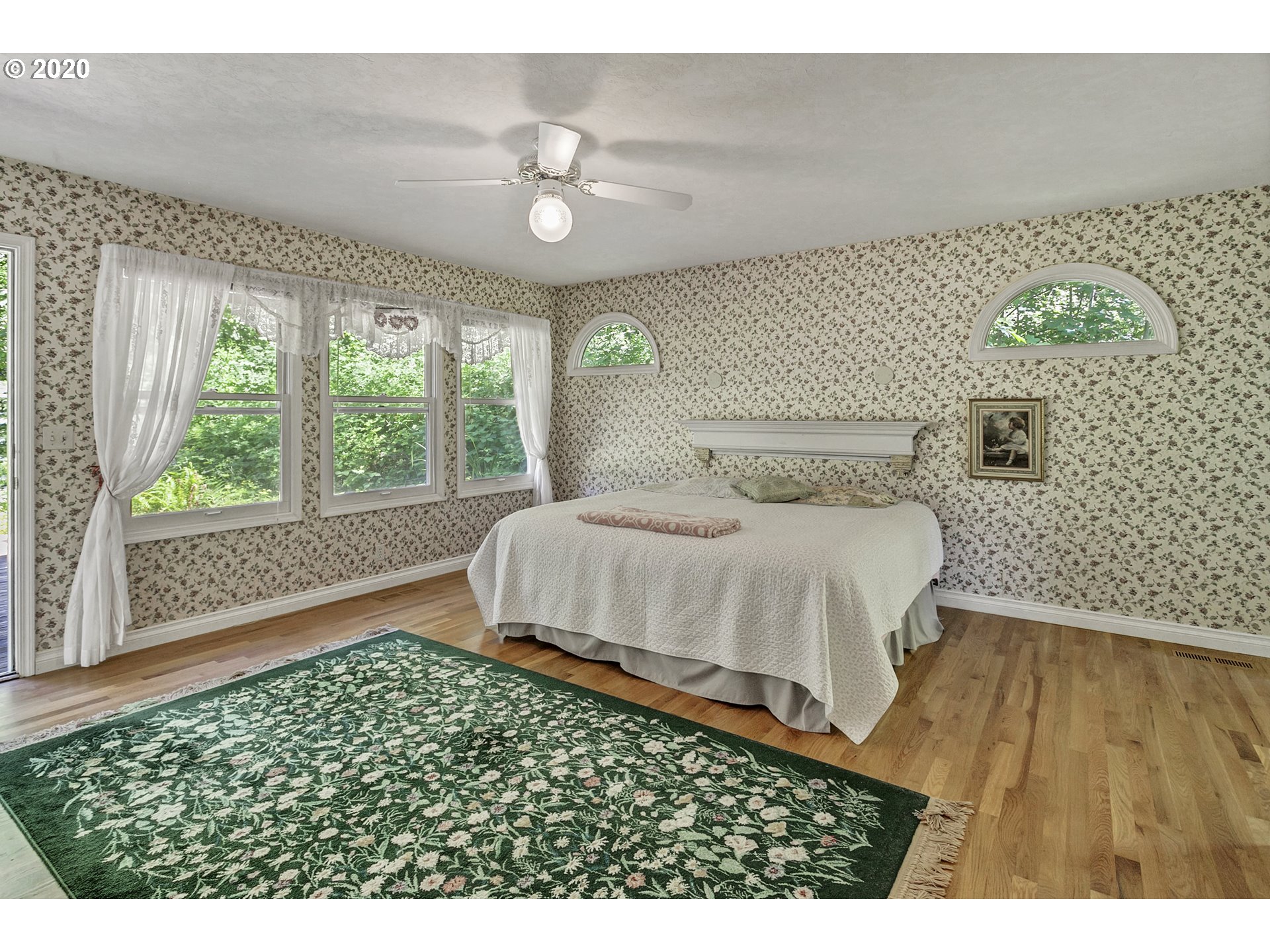 8888 Southeast Rodlun Road Damascus, OR 97089 - Photo 16 of 29 a bedroom with a bed and a window