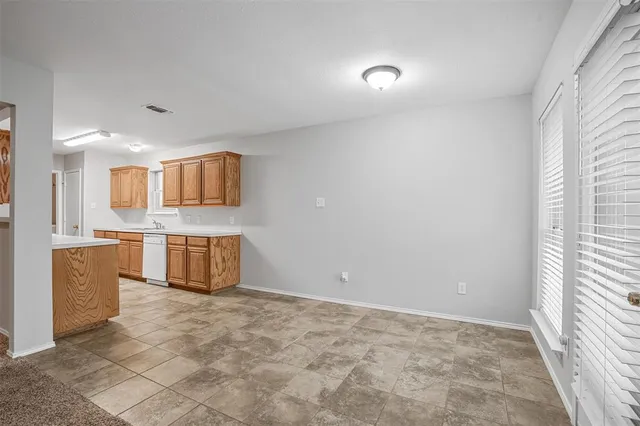 a view of a kitchen with a sink