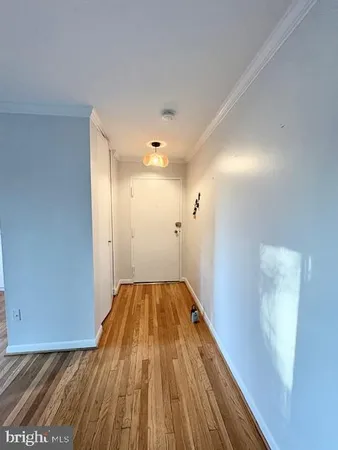 a view of a livingroom with wooden floor