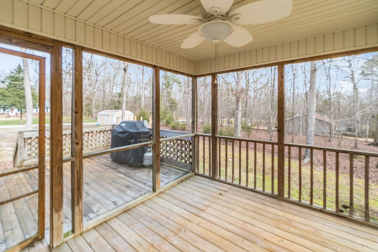 5712 Novaglen Road Durham, NC 27712 - Photo 20 of 27 Screened back porch connects you with your backyard oasis! Sun Room
