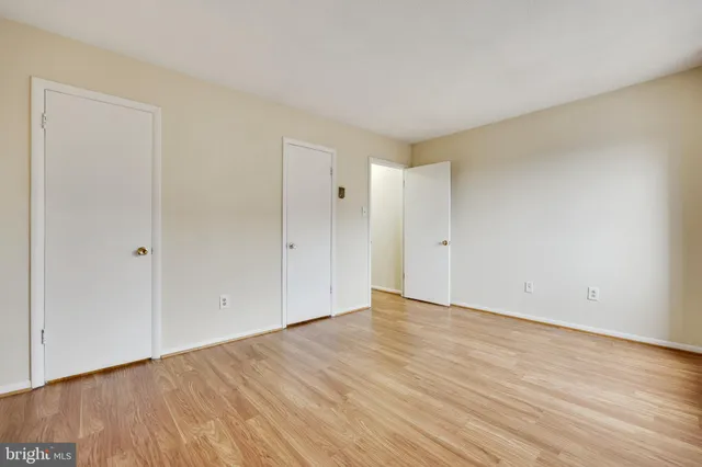 a view of a livingroom with furniture and a table
