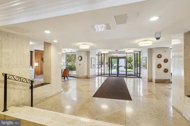 a view of a kitchen from the hallway