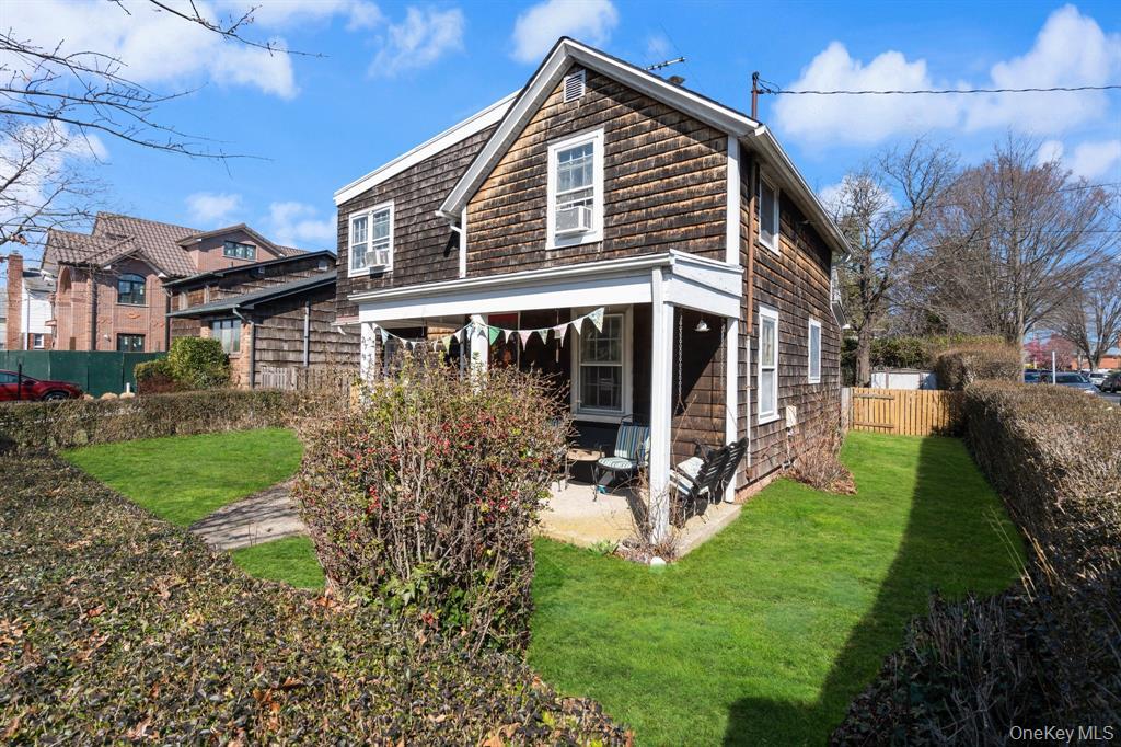 217-19 39th Avenue Queens, NY 11361 - Photo 3 of 38 a view of house with a yard