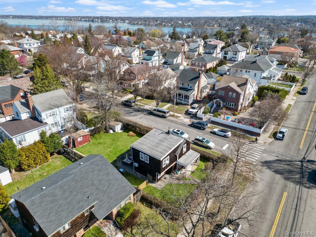 217-19 39th Avenue Queens, NY 11361 - Photo 31 of 38 an aerial view of a city with lots of residential buildings