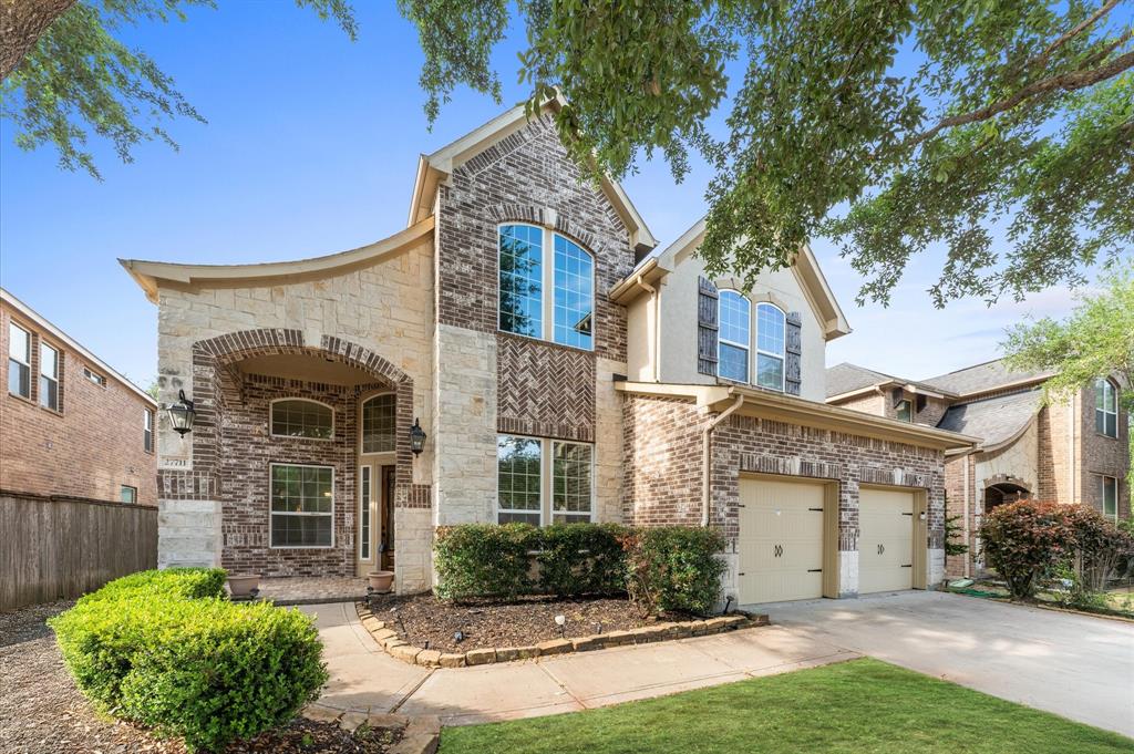 27711 Gable Creek Court Katy, TX 77494 - Photo 1 of 38 front view of a house with a yard