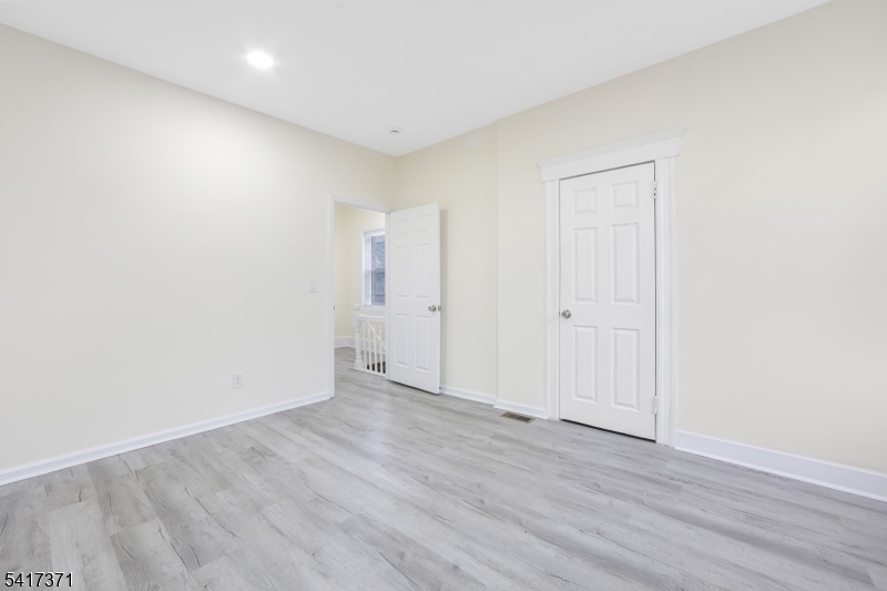88 Devon Street Kearny, NJ 07032 - Photo 12 of 16 a view of an empty room