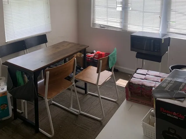 a view of a dining room with furniture