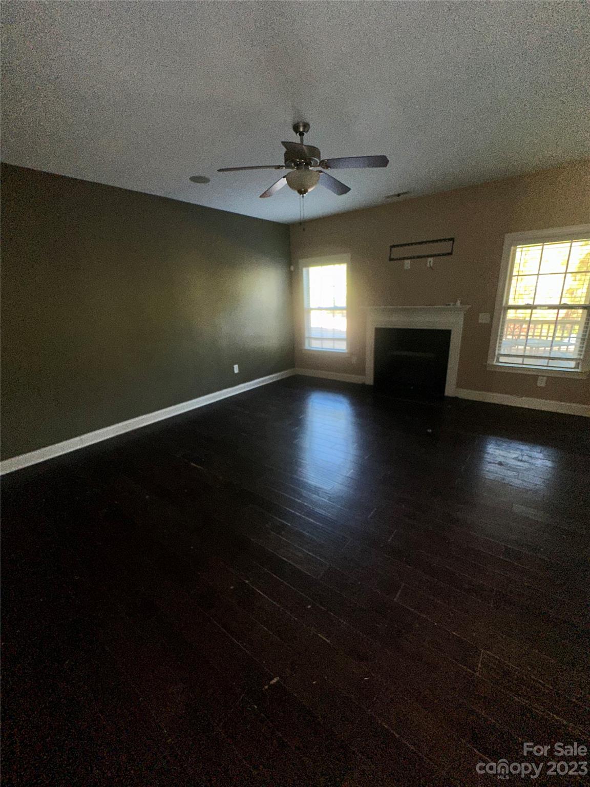131 Revolutionary Road Cameron, NC 28326 - Photo 12 of 16 wooden floor in an empty room with a window