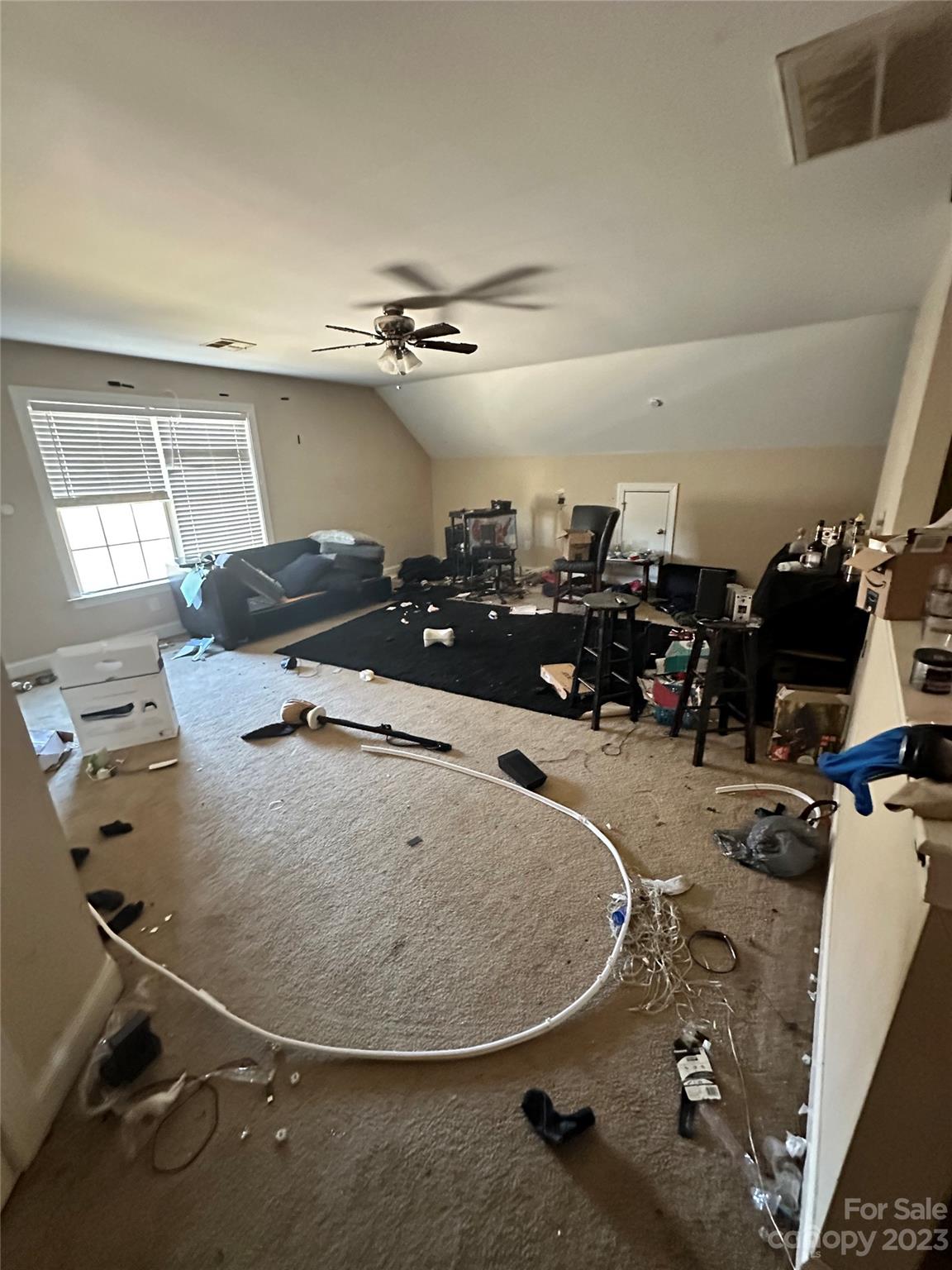 131 Revolutionary Road Cameron, NC 28326 - Photo 4 of 16 a room with gym equipment and a mirror