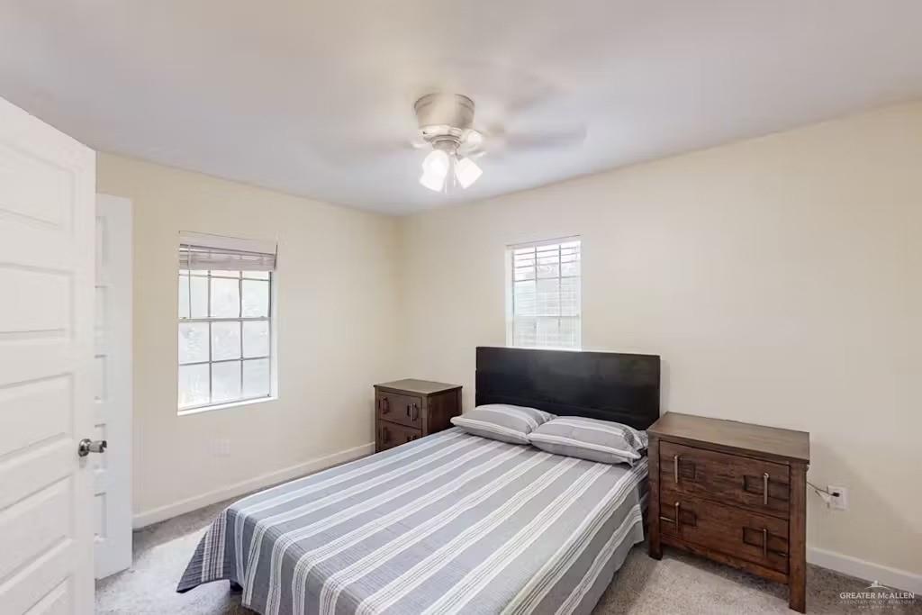 2153 El Rancho Road McAllen, TX 78503 - Photo 12 of 36 a bedroom with a bed and a window