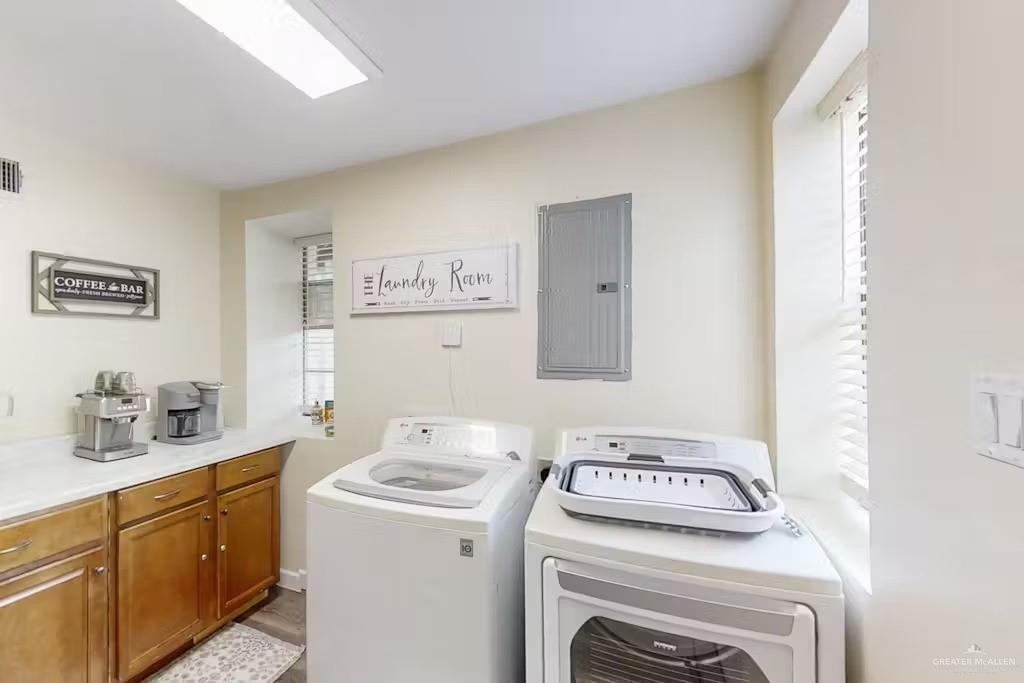 2153 El Rancho Road McAllen, TX 78503 - Photo 14 of 36 a utility room with dryer and washer