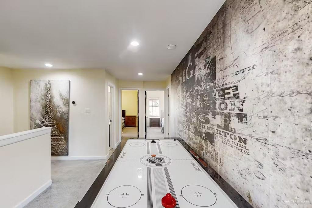 2153 El Rancho Road McAllen, TX 78503 - Photo 17 of 36 a bathroom with a sink and a large mirror