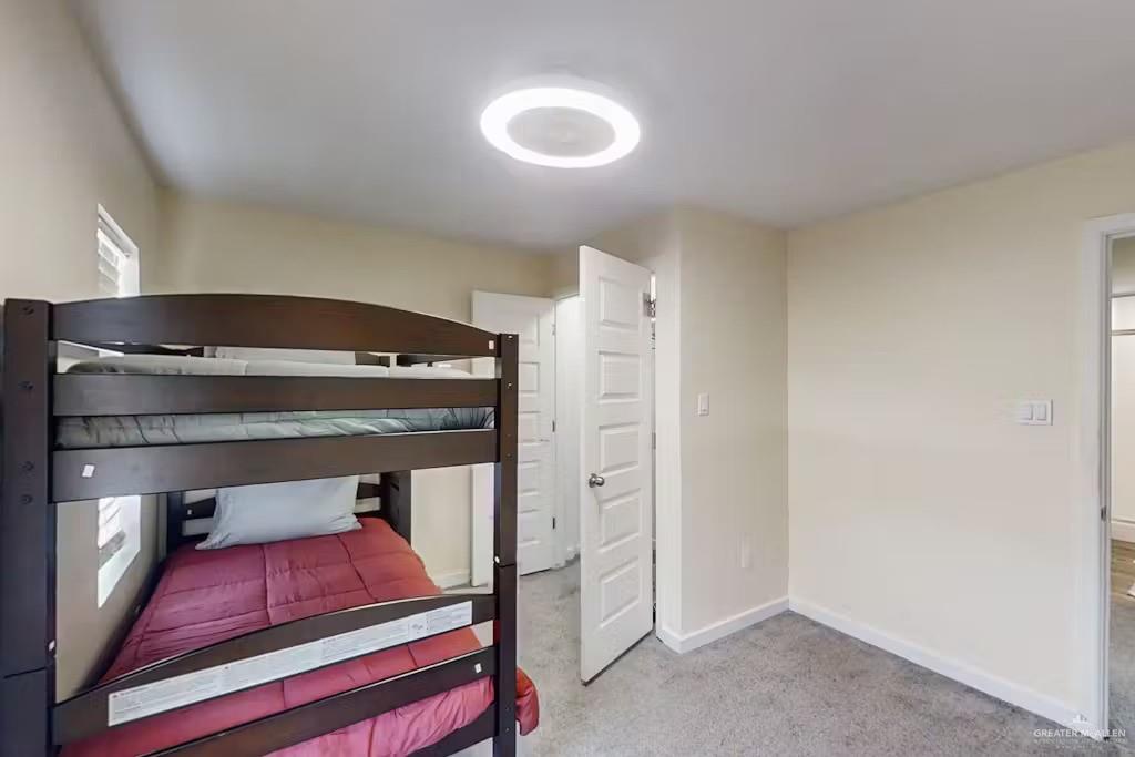 2153 El Rancho Road McAllen, TX 78503 - Photo 19 of 36 a room with pool table and a chandelier