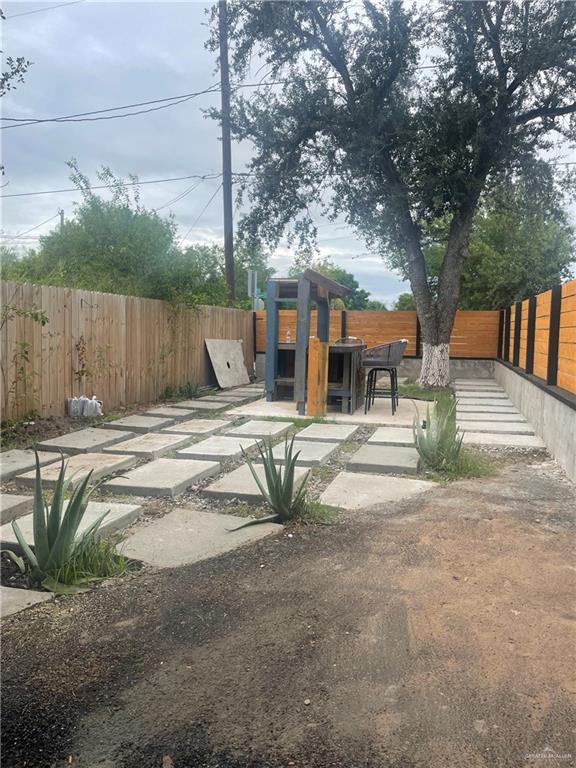 2153 El Rancho Road McAllen, TX 78503 - Photo 29 of 36 a view of a park with bench and trees
