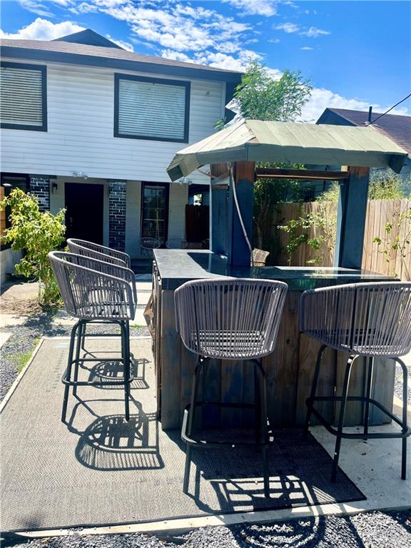 2153 El Rancho Road McAllen, TX 78503 - Photo 33 of 36 a view of a patio with a table and chairs