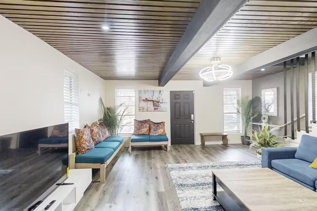 2153 El Rancho Road McAllen, TX 78503 - Photo 8 of 36 a living room with furniture and wooden floor