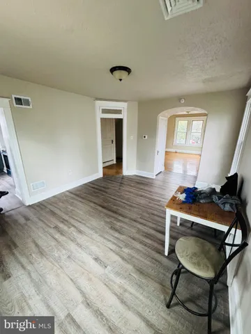 a room with a bed and a window