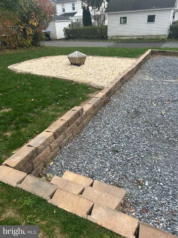 a view of a backyard with green space