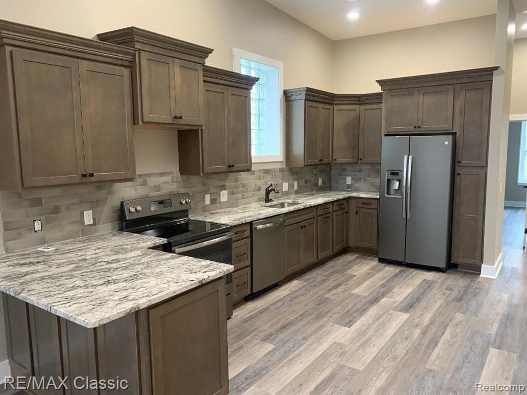 109-2 West Grand River Road Howell, MI 48843 - Photo 1 of 13